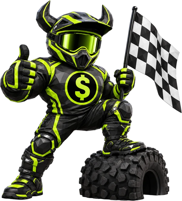 Max the off-road racer giving a thumbs up, one boot on a giant knobby tire, planting a checkered flag